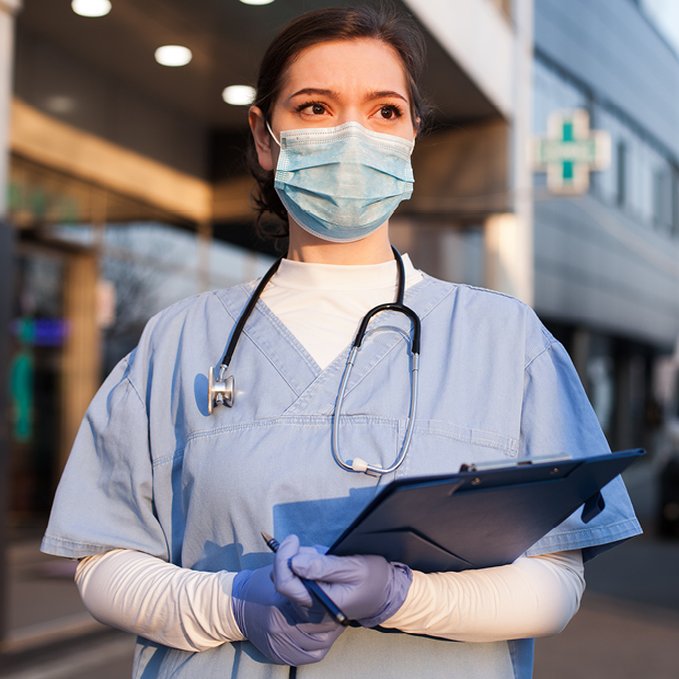 key worker holding clipboard