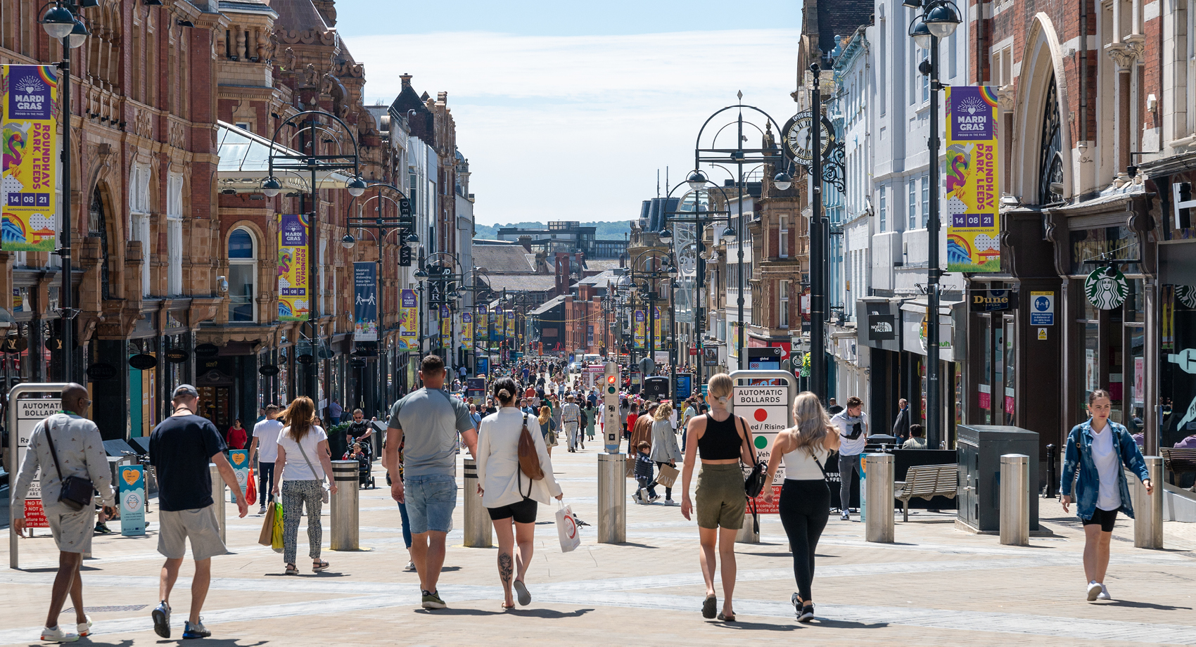 people walking down high street