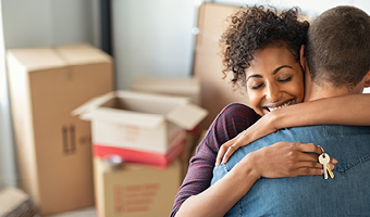 people celebrating moving into a new house